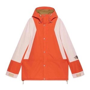 The North Face Vibrant Orange and Soft Cream Jacket